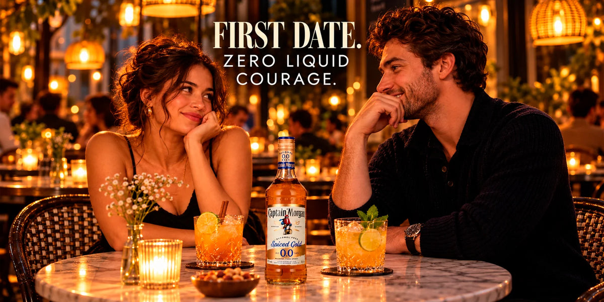Captain Morgan Spiced Gold 0.0 alcohol-free spirit served in citrus cocktails during a romantic first date at a warmly lit evening restaurant.